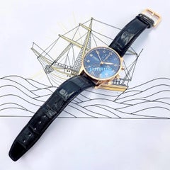 Montre IWC Portugieser Chronographe en or rose, bleu marine, fond squeletté, référence IW371614