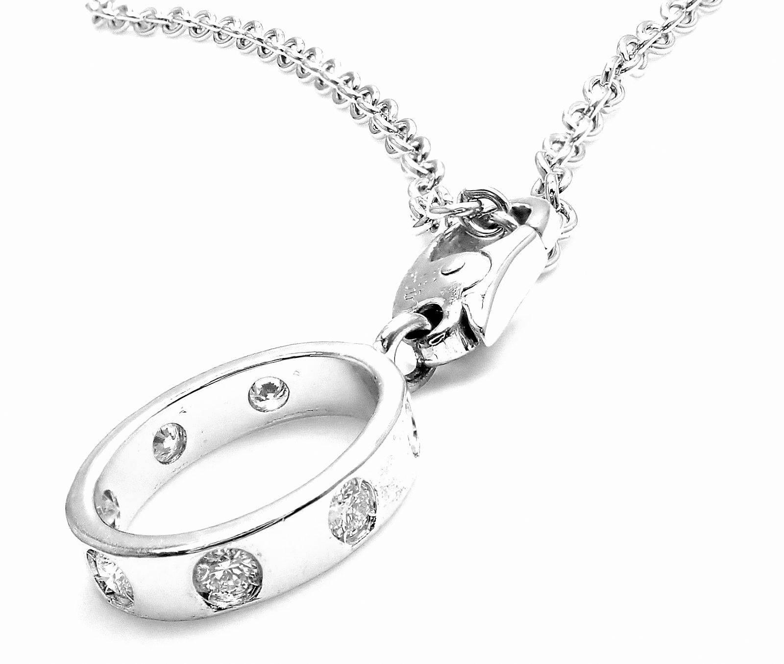 18k White Gold Diamond Love Charm Pendant Necklace by Cartier. 
With 7 round brilliant cut diamonds VS1 clarity, G color total weight approx. .33ct
Details: 
Measurements: Chain Length: 16.5