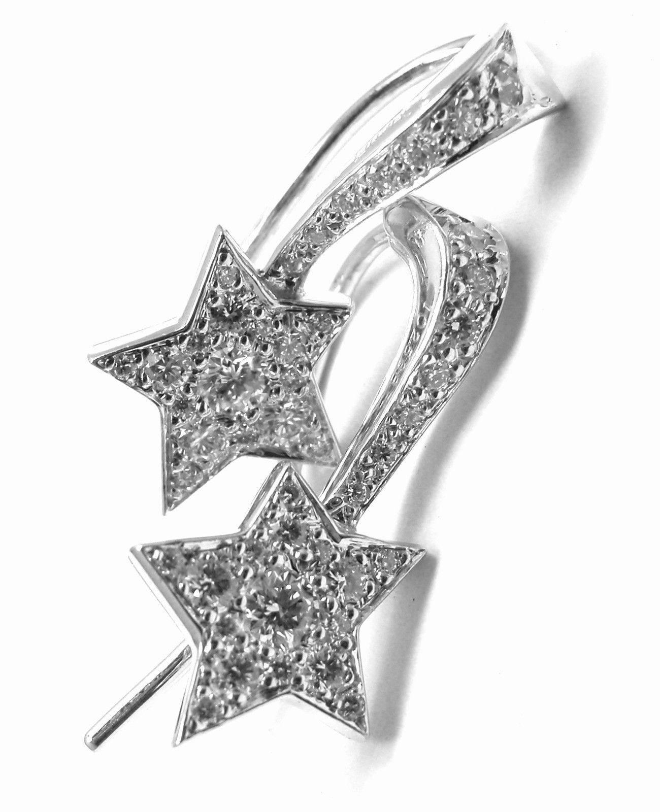 18k White Gold Diamond Star Comete Earrings by Chanel.
With 46 Round Brilliant Cut Diamonds, VVS1 Clarity, H Color. Total Diamond Weight: .60ct
These earrings are for pierced ears.
These earrings come with Chanel certificate and a