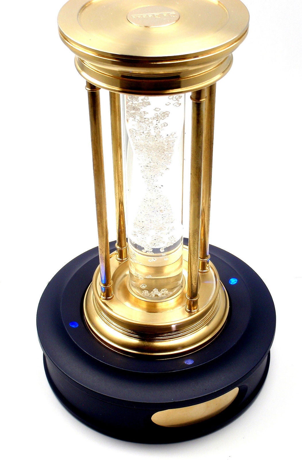 Very Rare! Limited Edition Millennium 2000 Diamond Brass Hourglass Timer  by De Beers.
This item comes with a box, light does now work in a stand.
Containing a cascade of over 2000 natural rough diamonds, weighing approximately 36 carats, suspended
