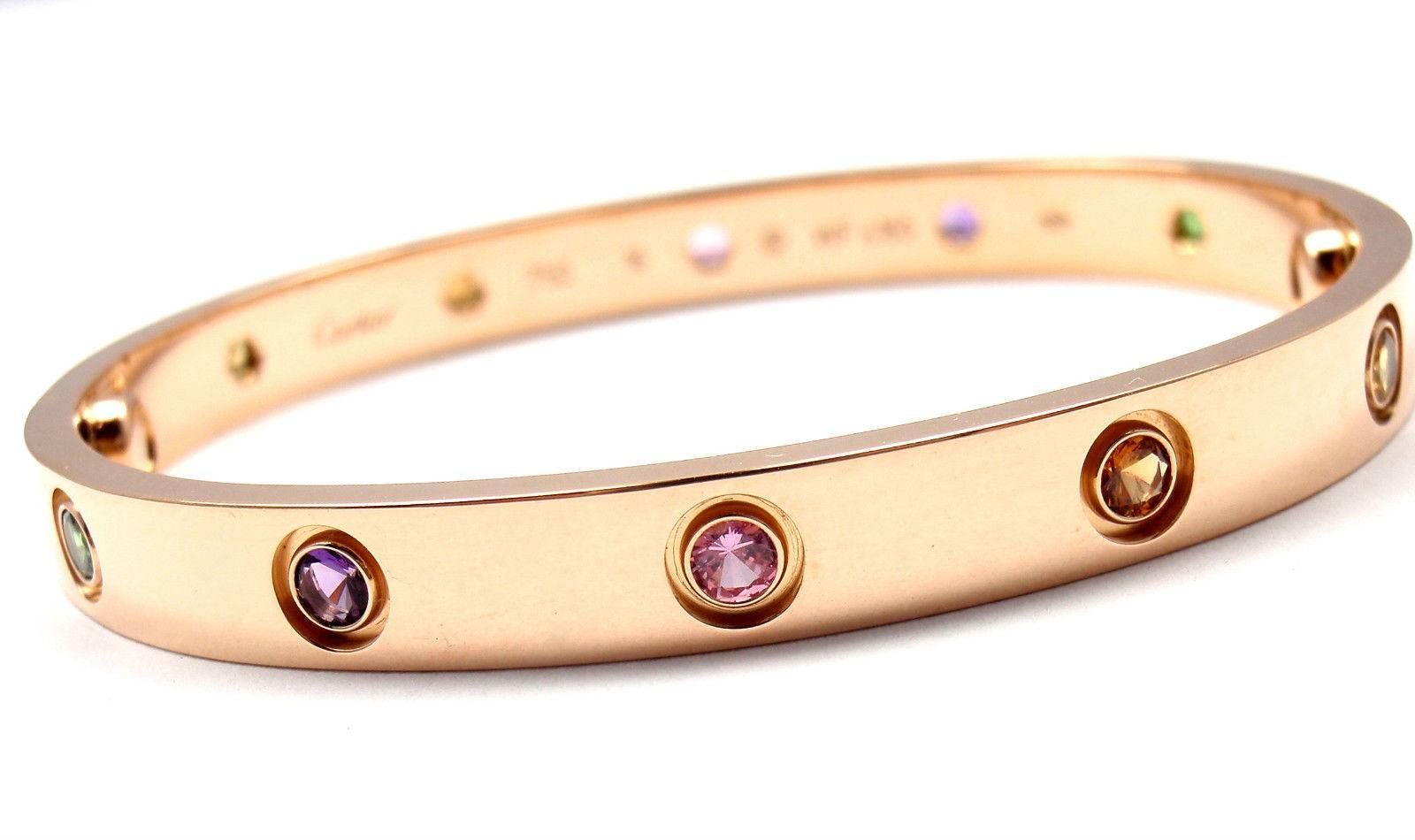 18k Rose Gold Color Stone LOVE Bangle Bracelet Size 16 by CARTIER. This beautiful bracelet comes with its original Cartier box and a screwdriver.
This bracelet has new screw system.
With 2 yellow sapphires, 2 pink sapphires,
2 green garnets, 2