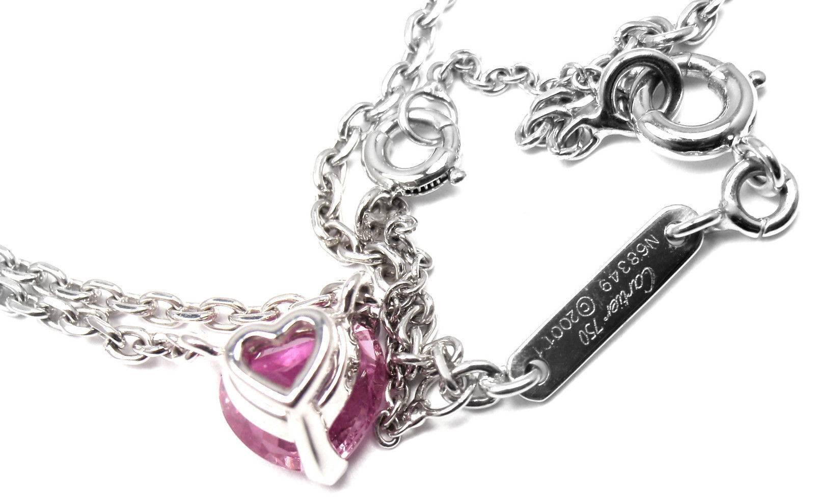18k White Gold Heart Shaped Pink Sapphire Pendant Necklace by Cartier. 
With 1 heart shape pink sapphire 6.8mm x 6.65mm x 3.29mm  
Details: 
Length: 16''  
Width: 2mm
Pendant: 6.8mm x 6.65mm x 3.29mm 
Weight: 4.8grams 
Stamped Hallmarks: 