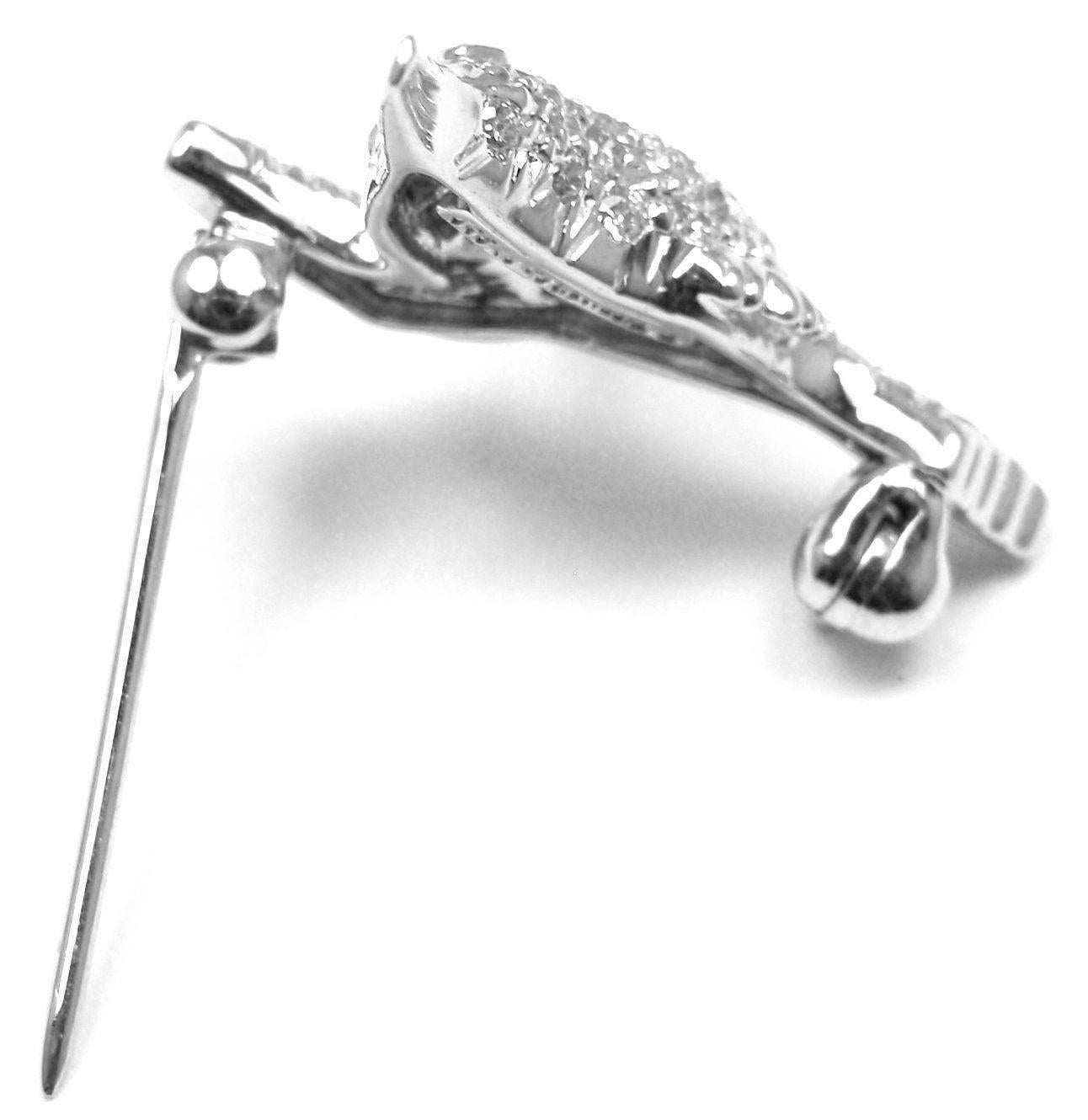 Platinum Diamond Crown Brooch Pin by Tiffany & Co. 
With round brilliant cut diamonds VS1 clarity, G color total weight approx. .75ct

Details:
Measurements: 21mm x 19mm
Weight: 3.9 grams 
Stamped Hallmarks: Tiffany & Co PT950 

*Shipping is