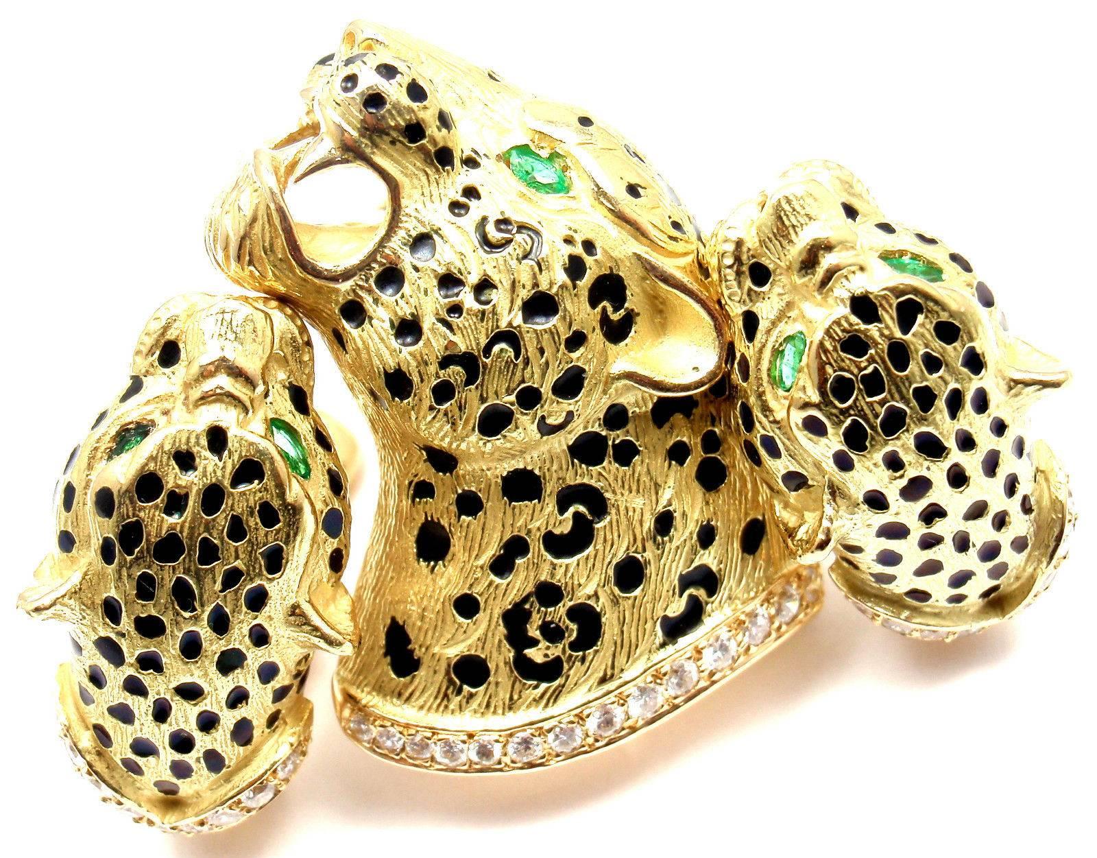 18k Yellow Gold Diamond & Emerald Leopard Brooch and Earrings Set 
by Gay Freres .
With 34 round brilliant cut diamonds SI1 clarity, G color 
total weight approx. .84ct
3 emeralds

Details:
Brooch: 34mm x 23mm x 14mm
Earrings: 25mm x 14mm x