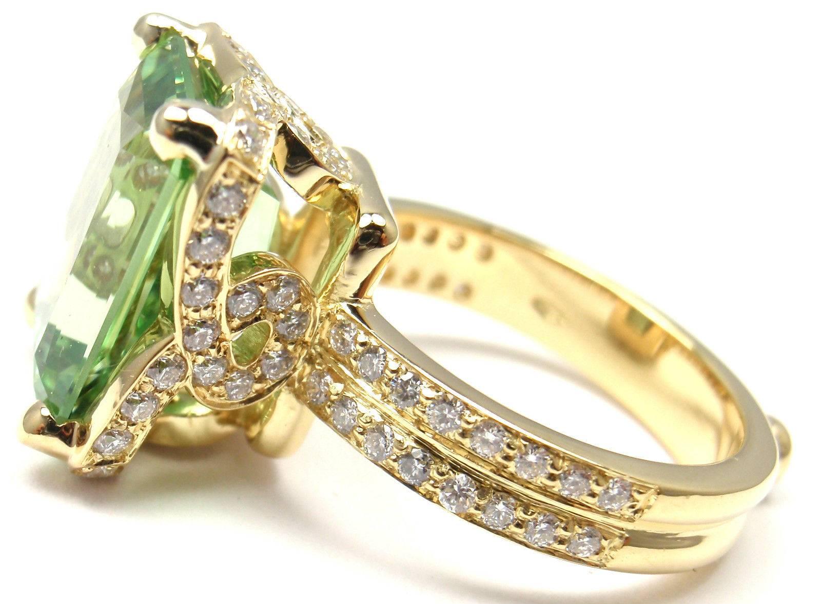 18k Yellow Gold Diamond & Tsavorite Ring by Temple St Clair. 
Total Diamond Weight: .837ct. 
Total Weight Tsavorite: 7.890ct.
This ring comes with AGL certificate and Temple St Clair pouch.

Details:
Ring Size: 6
Width: 15mm
Weight: 10.4