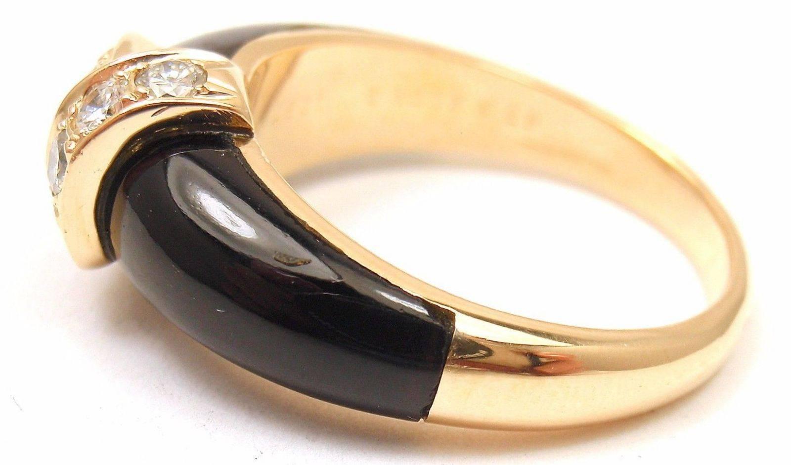 18k Yellow Gold Diamond & Black Onyx Ring by Van Cleef & Arpels. 
With 10 diamonds, VS clarity, G color. Total Diamond Weight: 45ct. 

Details: 
Ring Size: 6.5
Width: 8mm
Weight: 5.8 grams
Stamped Hallmarks:  750 Van Cleef and Arpels 0.45
