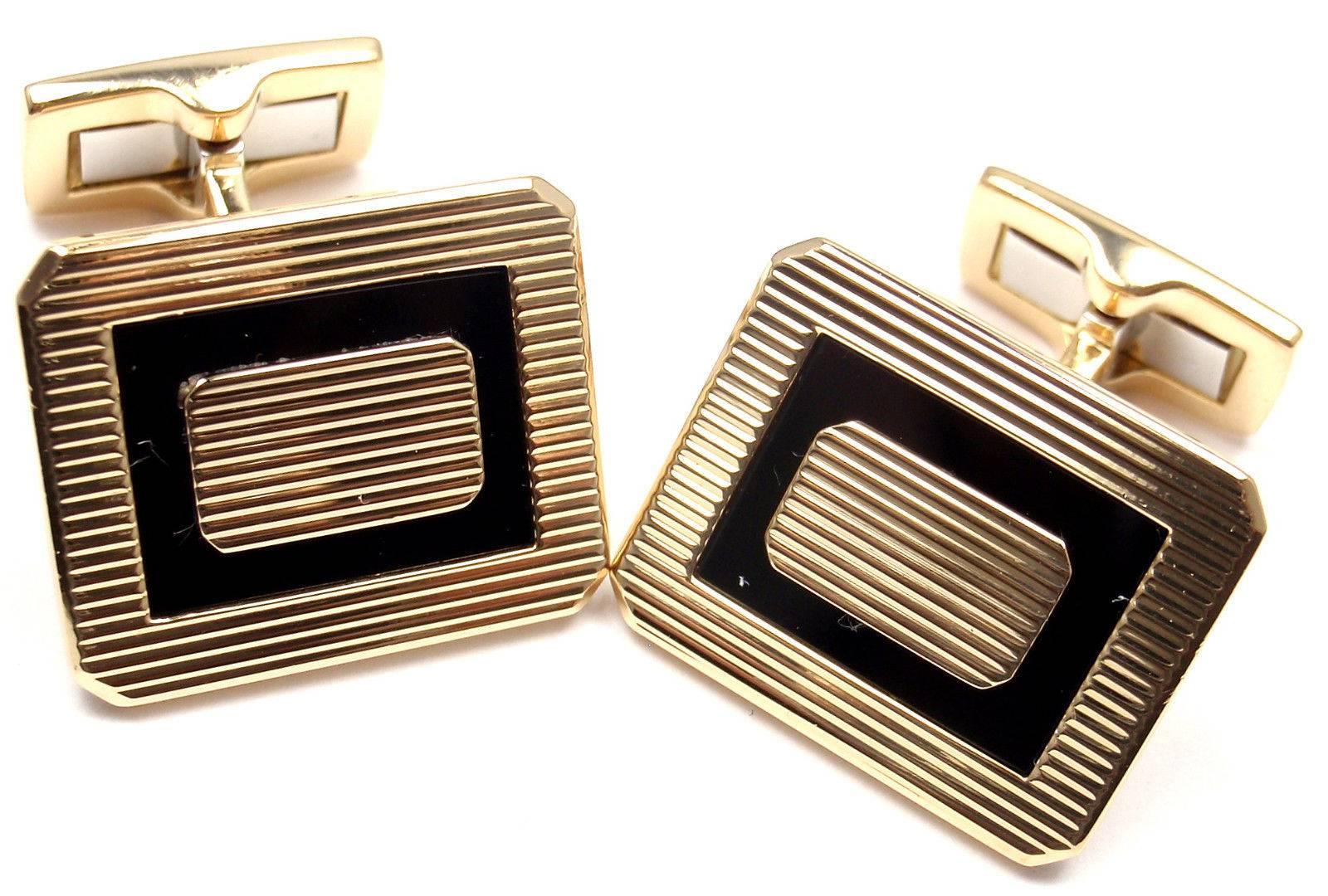 18k Yellow Gold And Black Onyx Cufflinks by Piaget.

Details: 
Cufflinks: 24mm x 20mm x 15mm
Weight:	19.7 grams
Stamped Hallmarks: Piaget 750

*Free Shipping within the United States*

YOUR PRICE: $2,700

0617mdhd