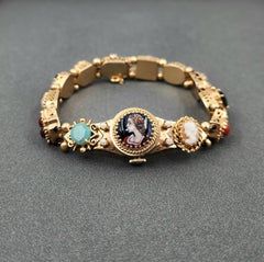 14k Yellow Gold Slide Charm Omega Gemstone Bracelet Watch