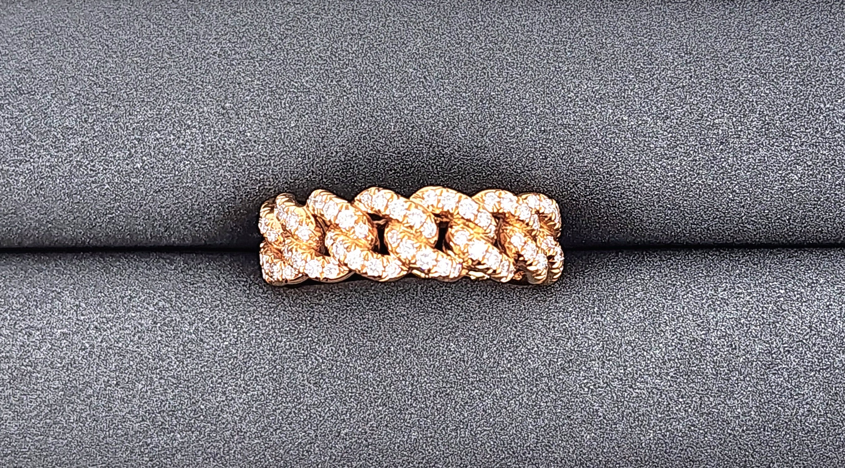 This band ring feature 18k rose gold and 140 diamonds weighing 1.24 ct. The diamonds boast a color of F/G and VS1 in clarity. A gorgeous ring to adorn any finger.