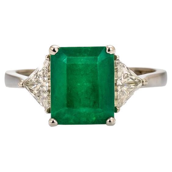 Goldring mit Smaragd und Diamant im Quadratschliff