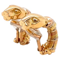 Boucles d'oreilles « Huggie » à clip Cartier Panthère en or tricolore 18 carats, avec notice