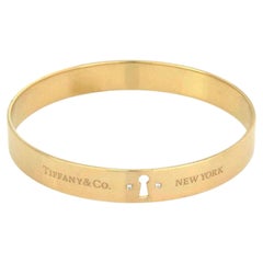 Tiffany & Co. 18k Yellow Gold Diamond Keyhole Lock Bangle Bracelet