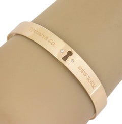 Tiffany & Co. 18k Yellow Gold Diamond Keyhole Lock Bangle Bracelet