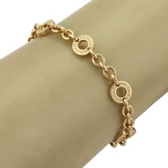 Bvlgari Engraved Circle Station 18k Yellow Gold Chain Bracelet 6.25"