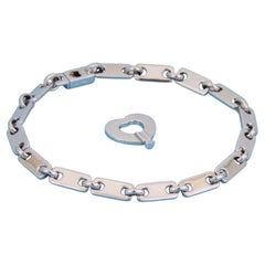 Pulsera de eslabones «Fidelity Heart Key» de Cartier, en oro blanco de 18k, con documentación, 7"