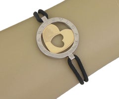 Bracciale Bvlgari Tondo Heart Circle in oro giallo 18 carati e cavo d'acciaio