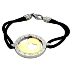 Bracciale Bvlgari Tondo Heart Circle in oro giallo 18 carati e cavo d'acciaio