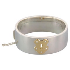 Tiffany & Co. Sterling Silver 18k Yellow Gold Wide Key Lock Bangle Bracelet