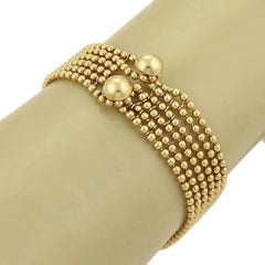 Bracelet Cartier « Draperie Décolleté » en or jaune 18 carats à plusieurs rangs, avec certificat, 6,5 pouces