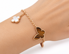 Van Cleef & Arpels Lucky Alhambra Armband aus 18 Karat Gelbgold mit 4 Motiven, mit Begleitpapier, 7,5"