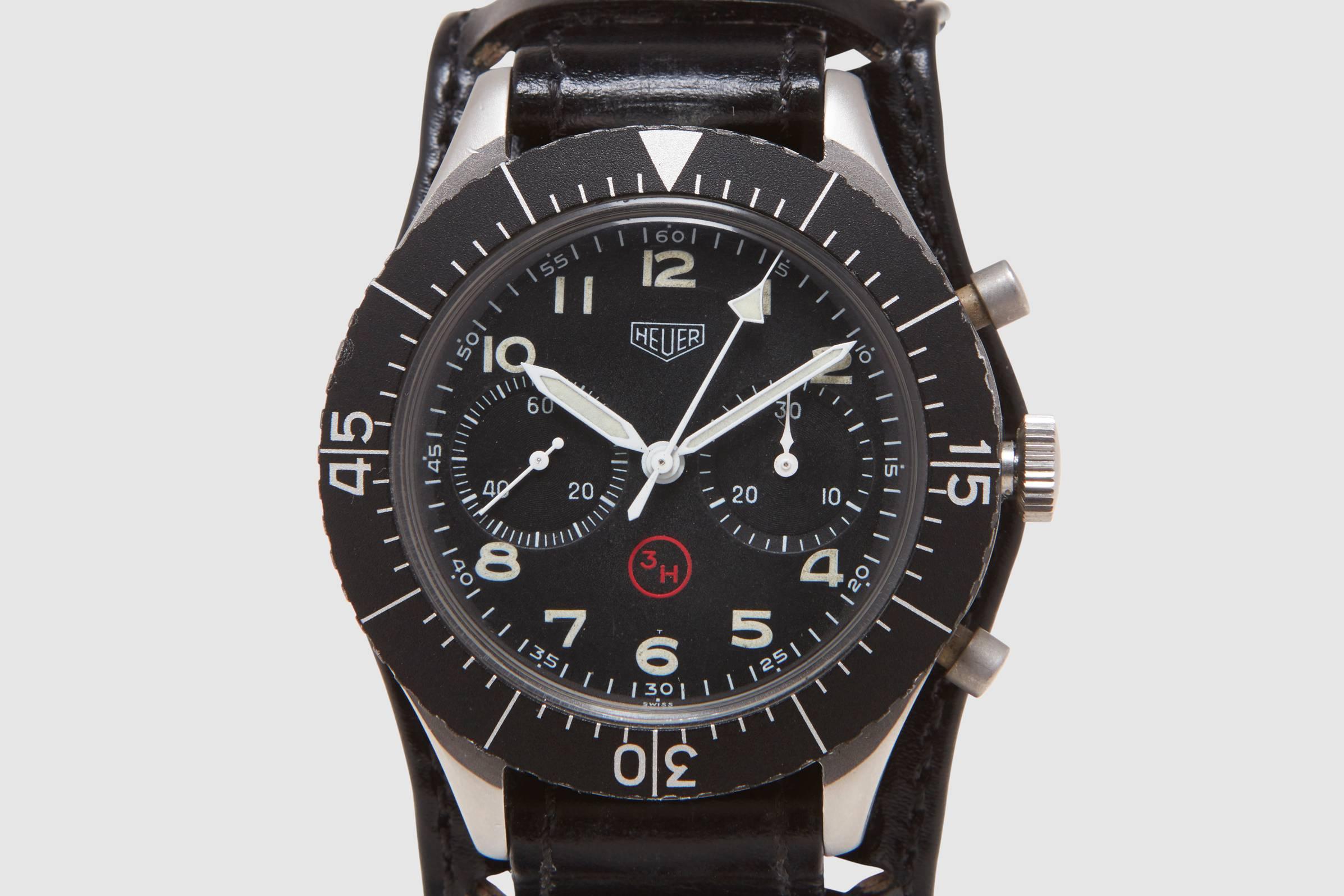 A brushed case Heuer Military Flyback chronograph wristwatch. This is an exceptional example of the Heuer made watches made for the German Air Force (part of the German armed forces or "Bundeswehr" hence the nickname). There are a number