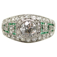 Art Deco Platinum Diamond Emerald and Pave Diamond Ring