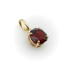 Tanzanian Octagon-Shaped Garnet in a 14K Gold Mount