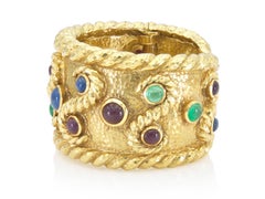 Bracelet manchette vintage David Webb des années 1970, en or et orné de multiples pierres précieuses