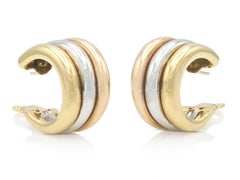 Boucles d'oreilles créoles Trinity Cartier vintage des années 1990