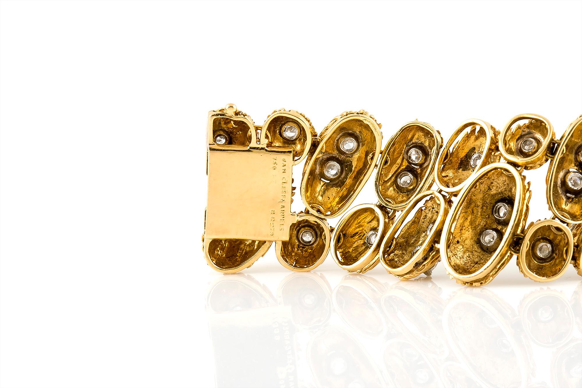 Bracelet, finely crafted in 18 k yellow gold with Round Brilliant cut diamonds, weighing a total of approximately 7.50 carat. Signed and numbered by Van Cleef & Arpels.
Circa 1950's
7.25'' long and 0.75'' wide.