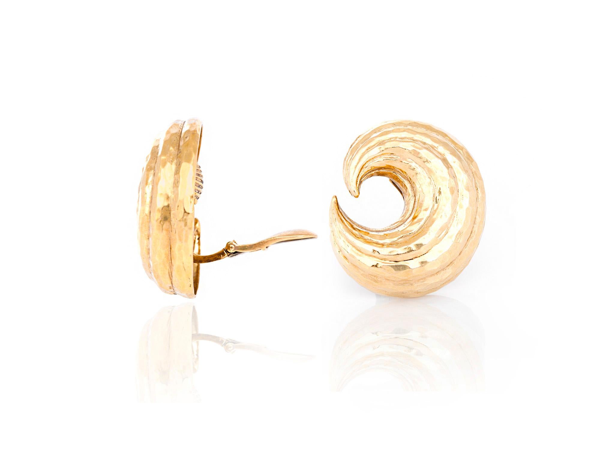 David Webb clip on earrings crafted in 18k yellow gold. 
