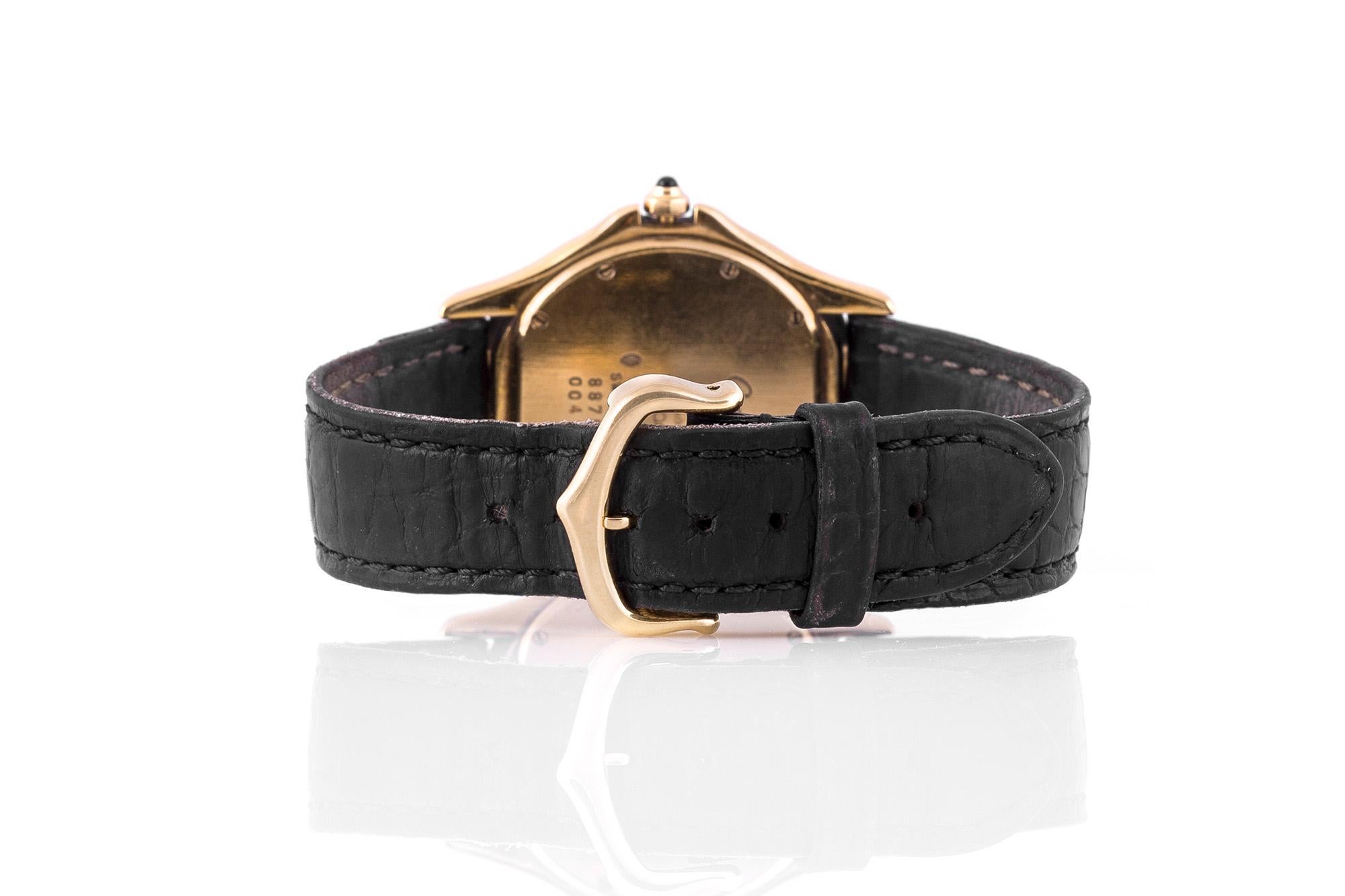 Cartier Cougar watch, finely crafted in 18k yellow gold on the original Cartier black alligator leather strap and original Cartier 18k yellow gold buckle, Quartz movement, Sapphire glass. Case diameter: 33 mm.