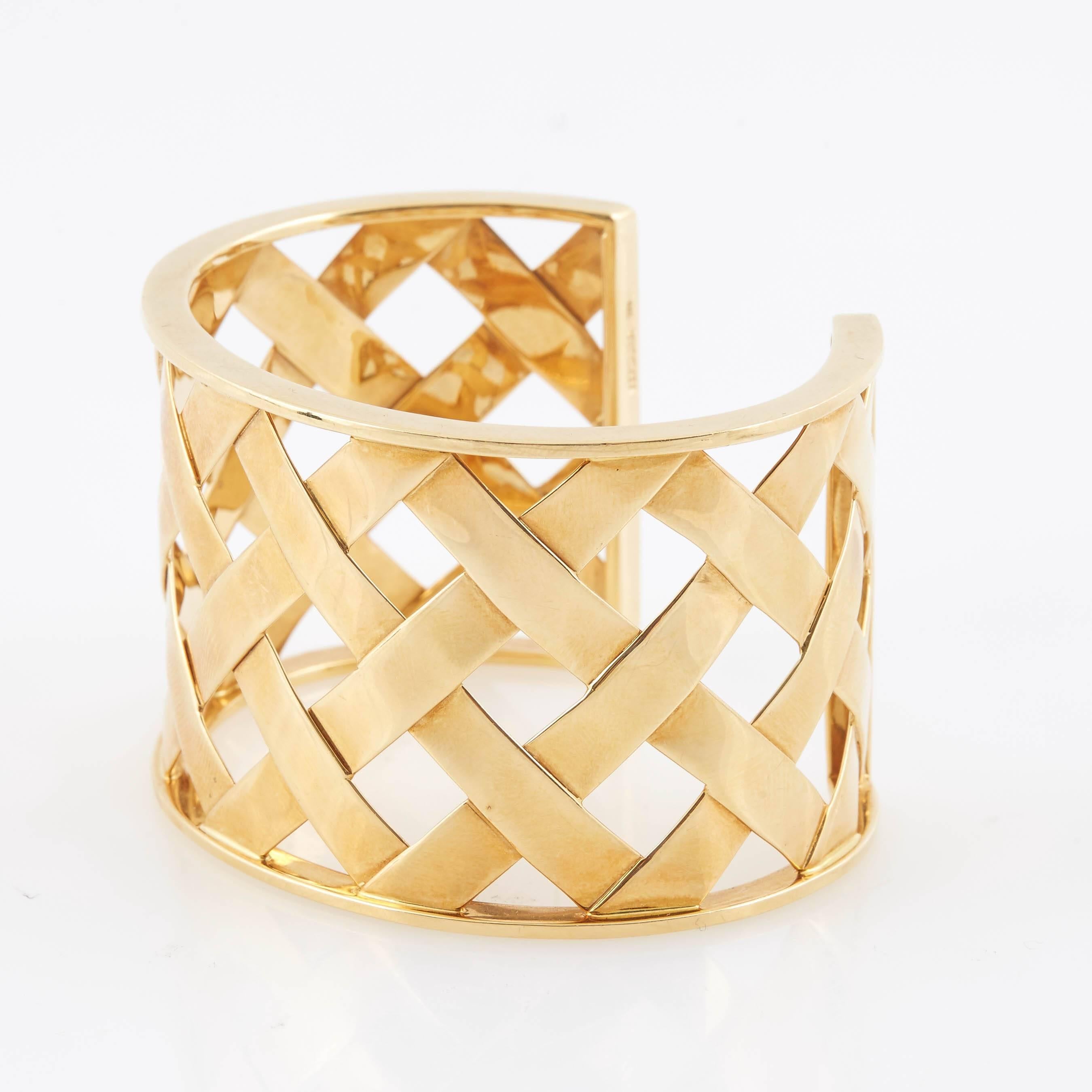 Beautiful Criss Cross cuff bracelet, in high-polished 18k rose gold. Slip-on style. Designed by Verdura. 