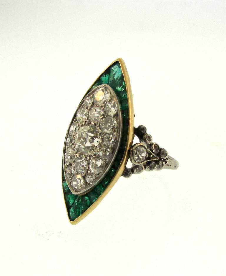 Edwaridan Diamond and Emerald Navette Ring
Diamonds and Emeralds set flush into a Platinum Navette Shaped setting
Platinum and 18K Gold
English
Circa 1915