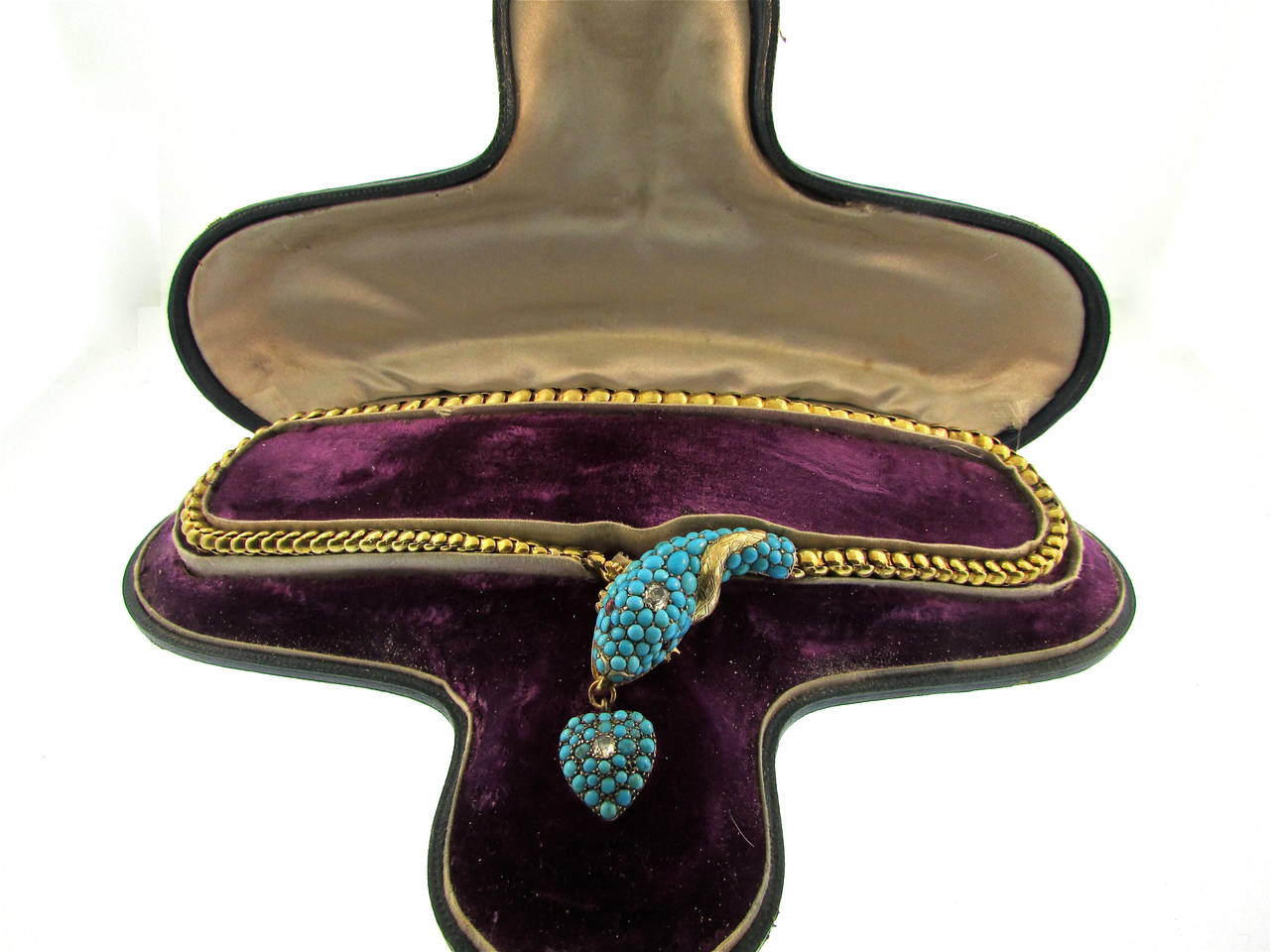 Sizeable, Glorious Victorian Turquoise, Ruby and Diamond Snake Necklace
15K Gold
In its original box
English
Circa 1880

Snakes were a popular Victorian motif, signifying eternal love.