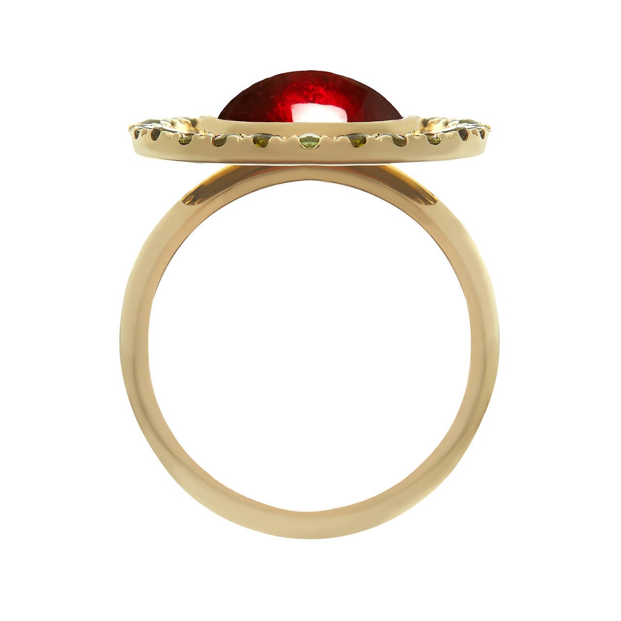 18ct yellow gold, garnet and green tourmaline ring
Hallmarked
Edition of 2
UK Ring Size N/O

In Tessa’s world wearing sweets is more fun than eating sweets. The designer cites the retro, sherbet-filled Flying Saucer sweet as the inspiration for this