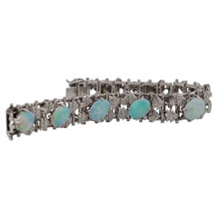 Armband aus 18-karätigem Weißgold mit Diamanten und Opalen – 17 cm