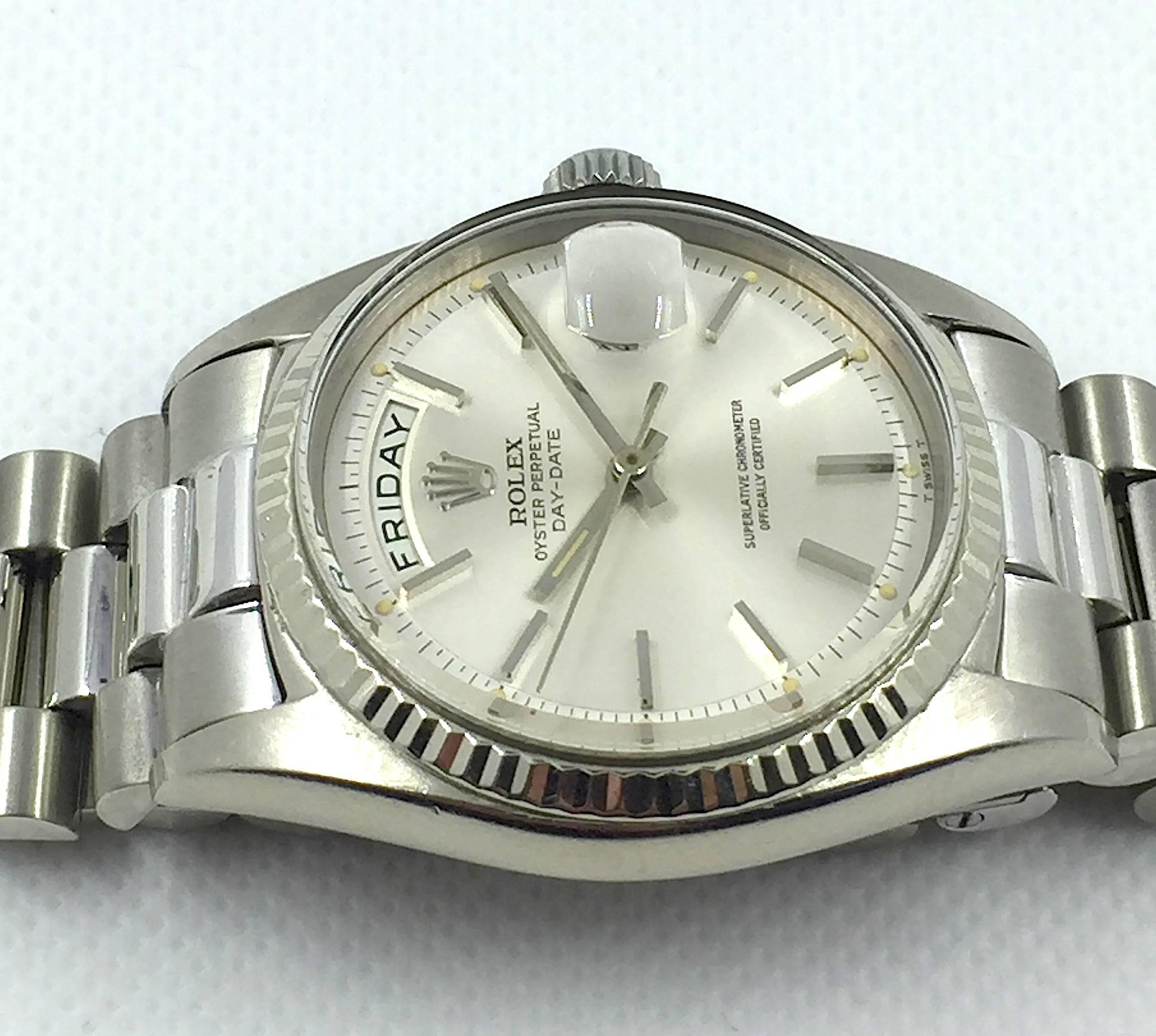 Rolex 18K White Gold Oyster Perepetual Day-Date Presidential Wristwatch
Factory Silvered Pie-Pan Dial with Applied Hour Markers
18K White Gold Fluted Bezel
36mm in size 
Rolex Calibre Base 1500 Automatic Movement
Acrylic Crystal
Late 1960's