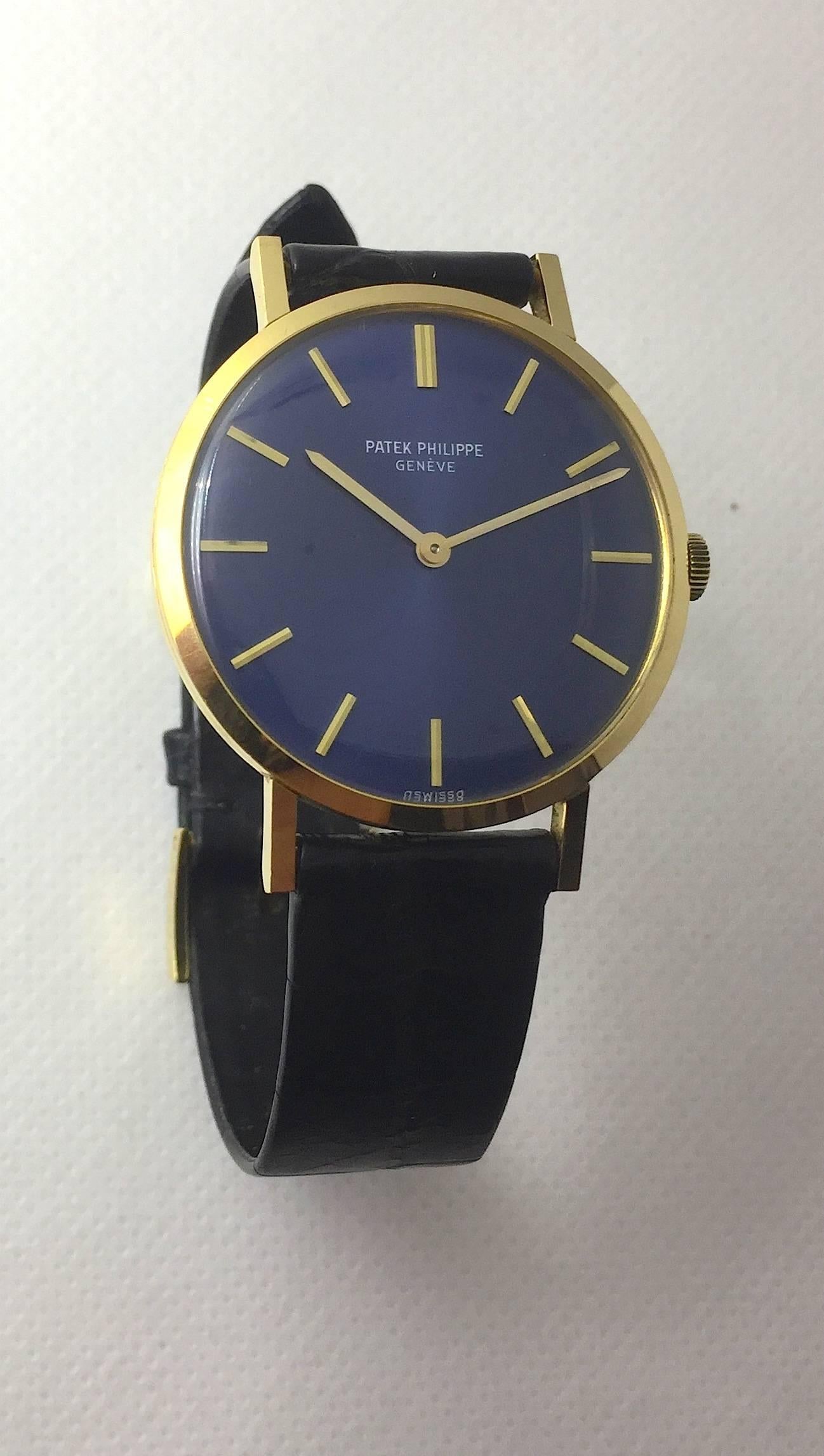 Patek Philippe 18K Yellow Gold Manual Wind Wristwatch
Calatrava Model
33mm in Size
Manual Wind Movement
Signed Patek Philippe Crown
Factory Blue Dial with Applied Gold Hour Markers
Patek Philippe Leather Band and 18K Yellow Gold Buckle
One-Year