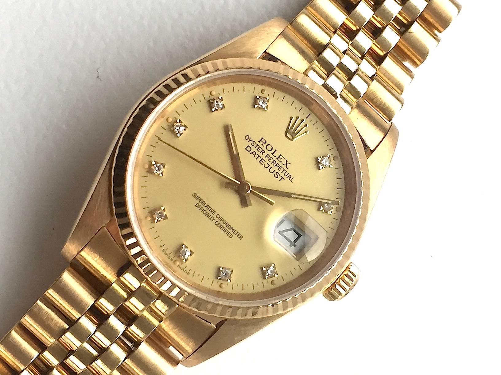 Rolex 18K Yellow Gold Oyster Perpetual Factory Diamond Dial Datejust Watch In Excellent Condition In New York, NY