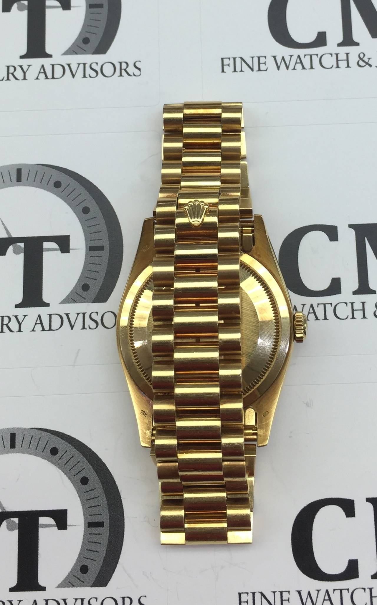 Rolex Yellow Gold Diamond Ruby Dial Day-Date Presidential Wristwatch In Excellent Condition In New York, NY