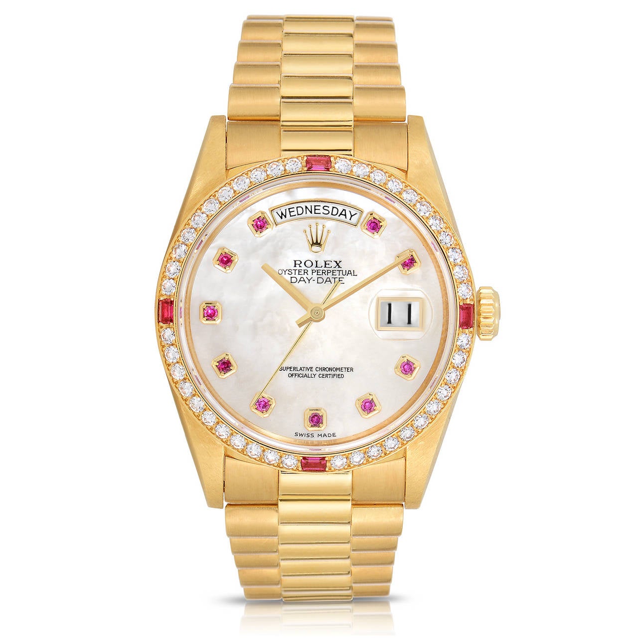 Rare Factory Rolex Day-Date Crown Collection Watch
Features A Factory Rolex Mother-of-Pearl Dial with Ruby Markers and Factory Diamond and Ruby Bezel
36mm in Size
Solid 18K Yellow Gold Case and Presidential Bracelet
Pristine Condition with Rolex