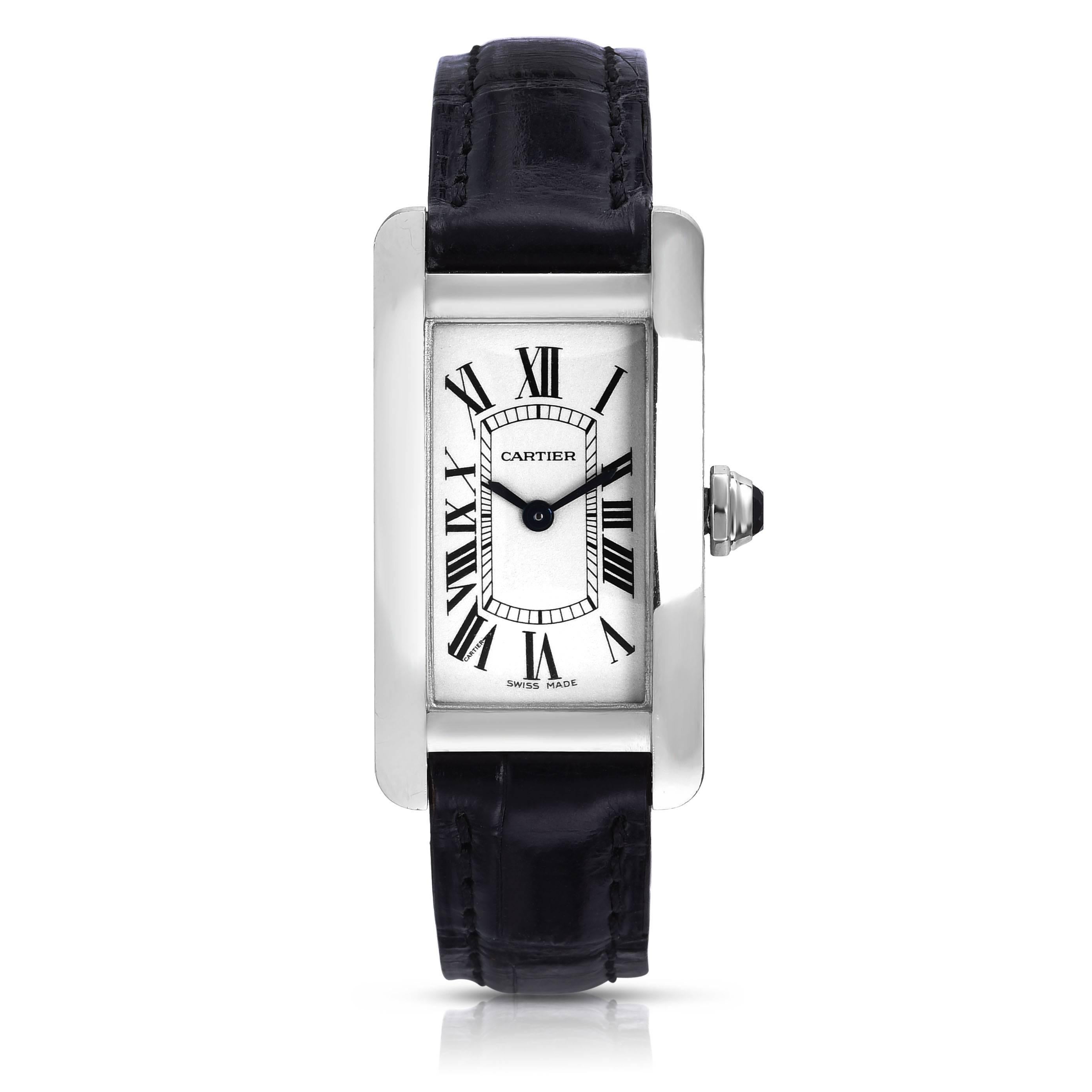 Cartier Tank Americain Ladies
Ladies - Case approx 19 mm x 35 mm
Reference 2489
Band / Bracelet Leather Cartier Strap Made in Paris w/ Cartier buckle
Movement Quartz movement
Dial	White dial w/Roman numerals 
Bezel	18K Gold White