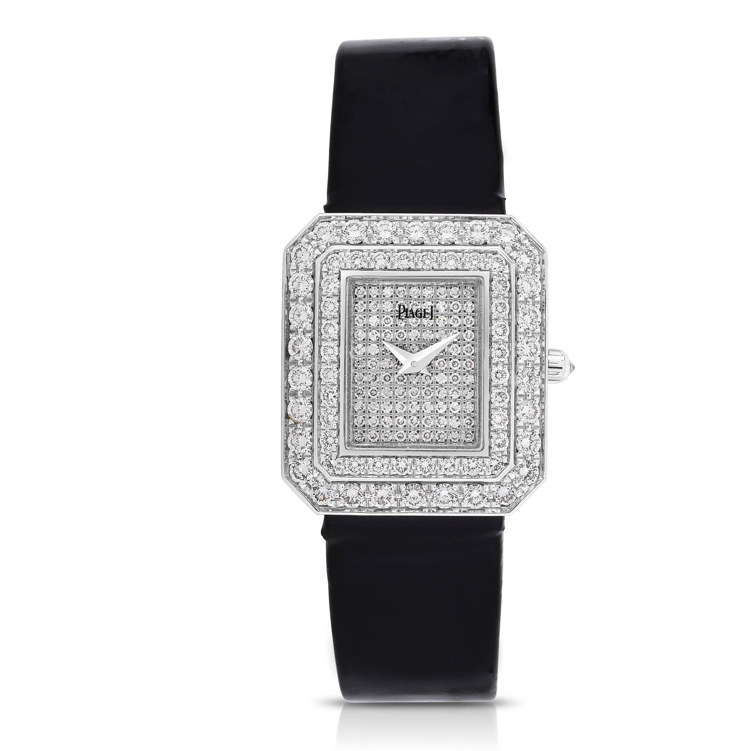 Ladies Piaget Protocole 18K White Gold and Diamond Dress Watch
Factory Diamond Dial, Bezel and Case
Quartz Movement 
Patent Leather Band
18K White Gold Deployment Buckle
Diamond Crown
In Pristine Condition
Fits Up to a 6.25
