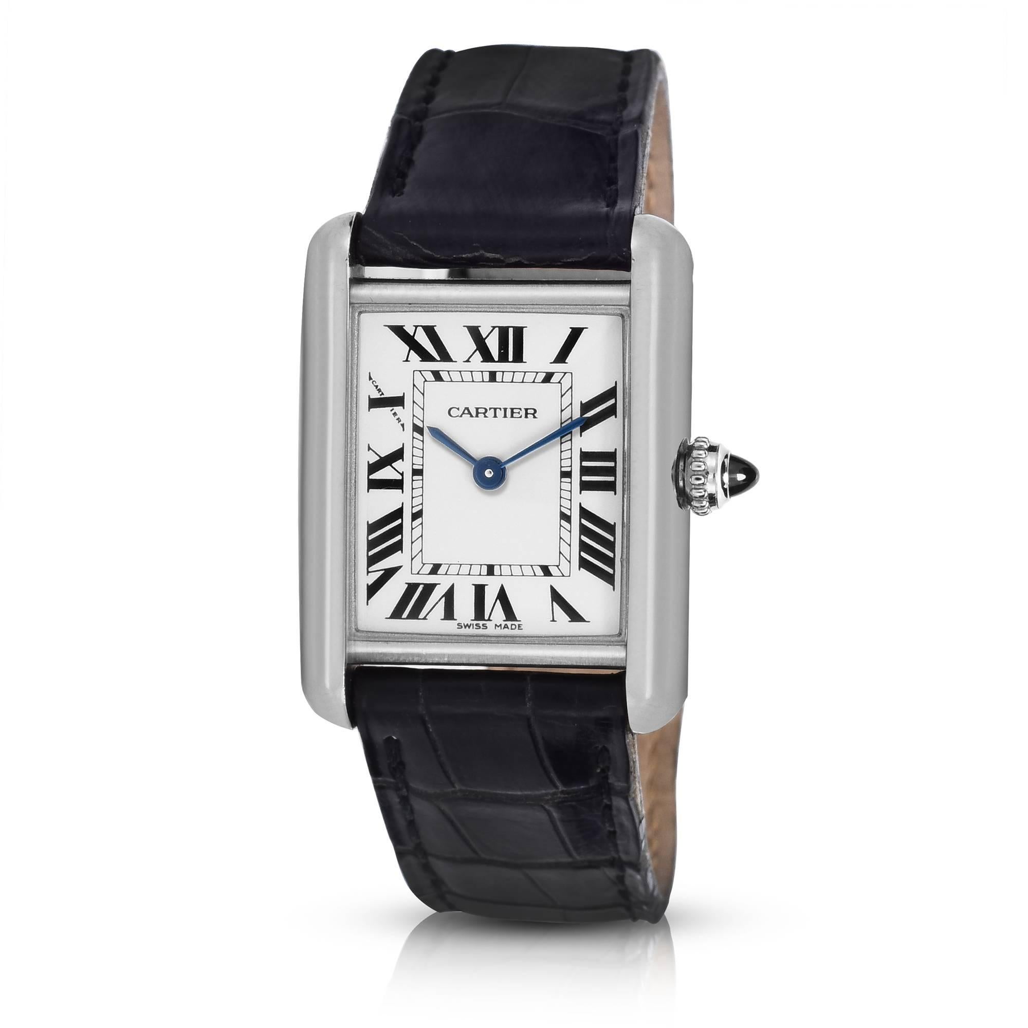 Cartier 18K White Gold Ladies Tank Quartz Watch Classic Cartier Tank Design with Roman Numeral Markers White Colored Dial with Cartier Blue Hands 22mm x 22mm Case Cartier Cabochon Crown Sapphire Crystal Quartz Movement Comes Fitted on A Pre-Owned