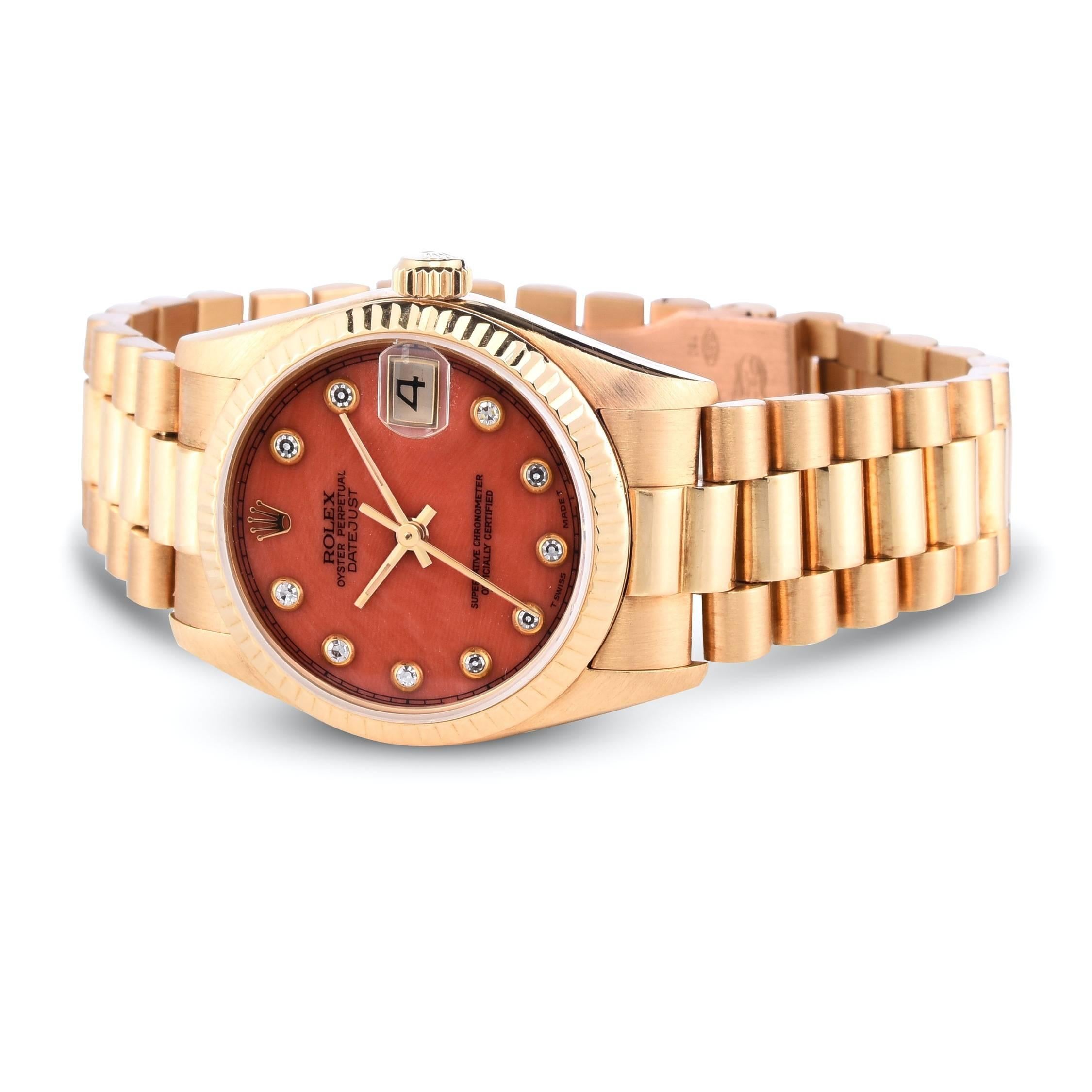 rolex coral dial