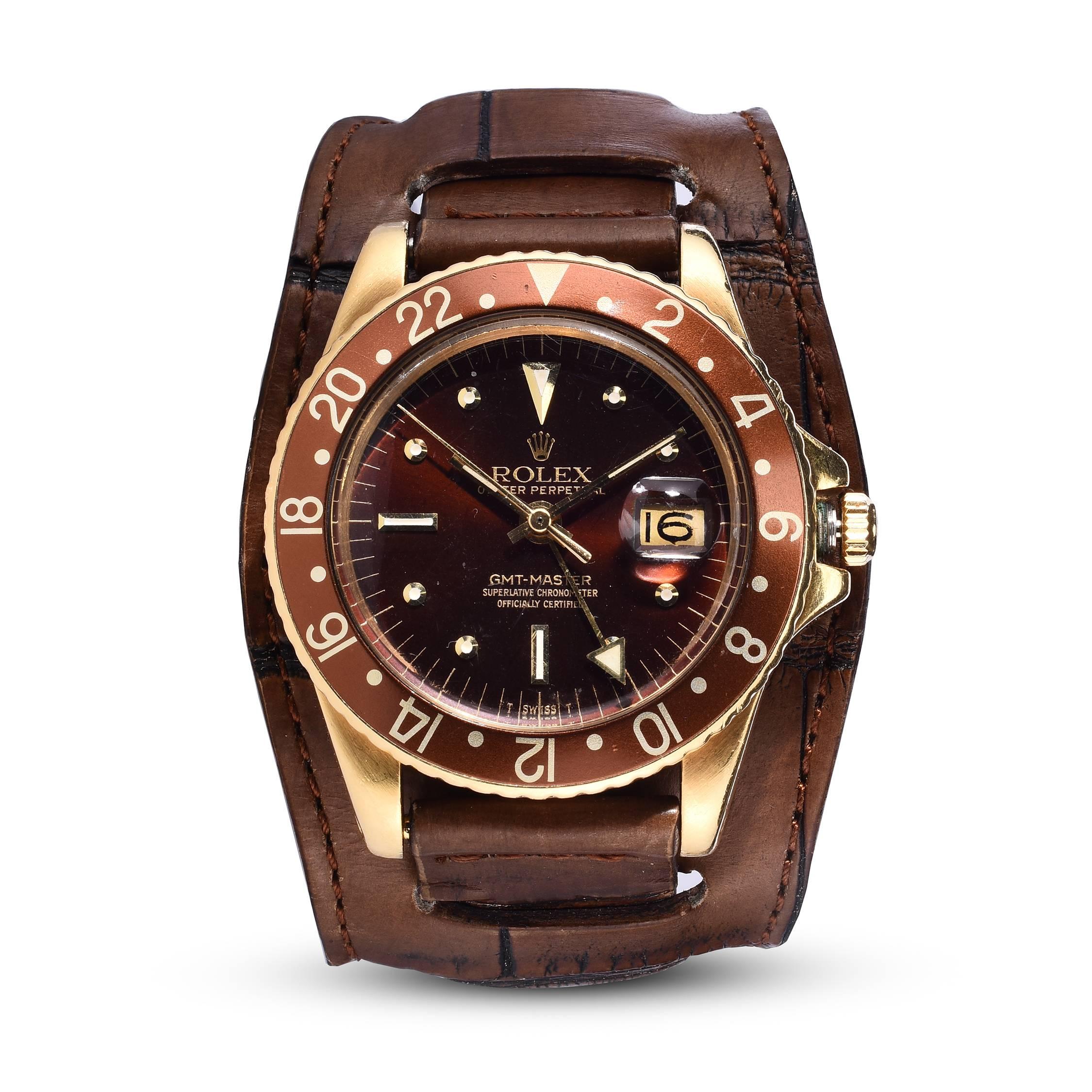 Rolex 18K Yellow Gold Oyster Perpetual GMT Master Concorde Watch
Rare Reference 1675 with 'Concorde' Hands Which are Highly Collectible and Sought After and Were Only Produced for Two to Three Years 
Brown Gloss Nipple Dial with Matching Brown
