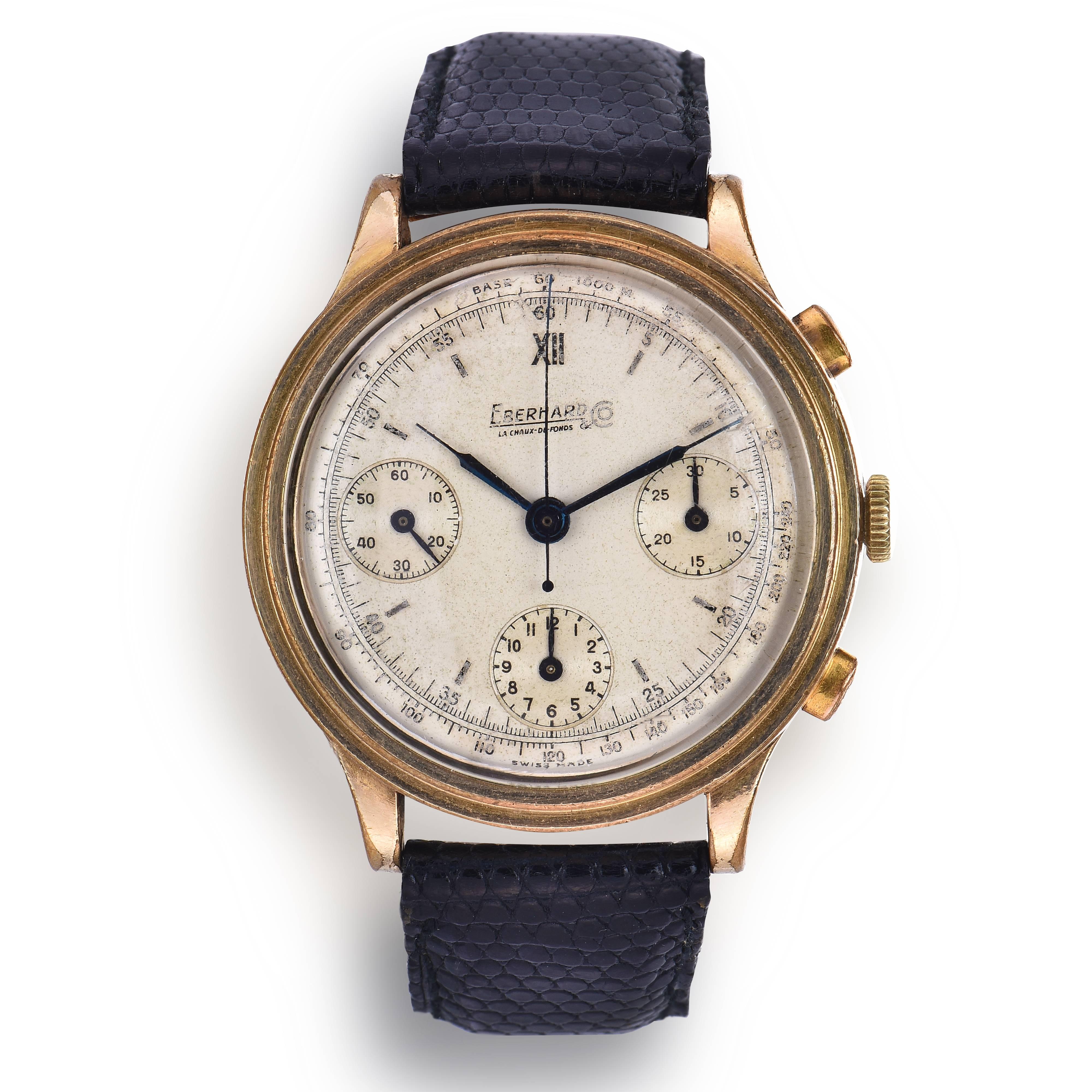 Eberhard & Co Chronograph Watch
Solid 18K Yellow Gold Case with 20 Micron Electroplated Case back
Manual Wind Movement
Silvered Three Register Dial with Patina and Blue Hands
Flyback Chronograph Function
Bottom Button in Chronograph Slides Up