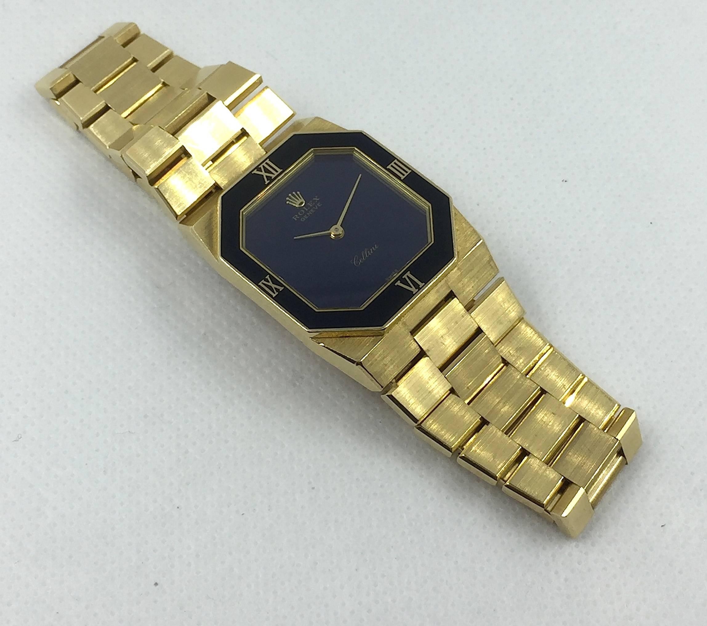 Rolex Cellini 18K Yellow Gold Manual Wind Wristwatch
Factory Blue Stone Dial with Applied Rolex Crown
Solid 18K Yellow Gold Case and Bracelet
Dark Blue Geometrical Bezel ( Bezel shows some signs of wear and marks) with Roman Numeral Markers 
24mm x