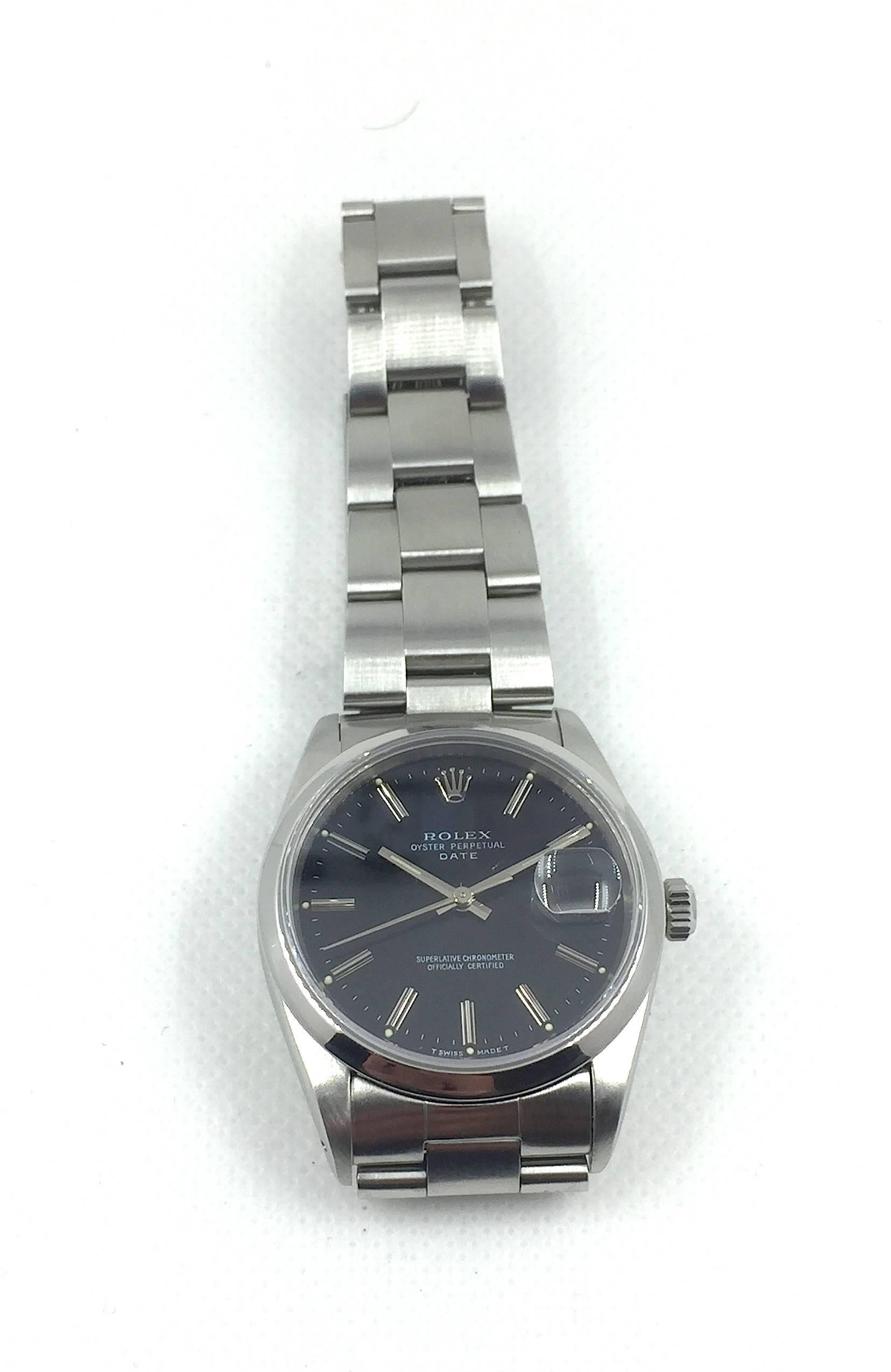 Rolex Stainless Steel Oyster Perpetual Date Wristwatch
Factory Black Dial with Applied Hour Markers and Luminous Hands
Stainless Steel Smooth Bezel
34mm in size 
Rolex Calibre Base 3000 Automatic Movement
Sapphire Crystal
Early 1990's